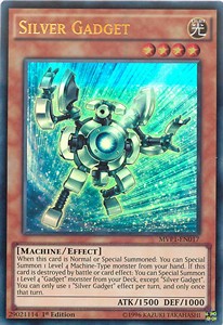 /products/ygo/sil/silver-gadget-v1-ultra-rare/the-dark-side-of-dimensions-movie-pack-silver-gadget-v1-ultra-rare-291317.jpg